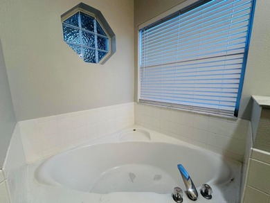 Move-In Ready in Gated Harbor Hills Golf Community - NEW ROOF on Harbor Hills Country Club in Florida - for sale on GolfHomes.com, golf home, golf lot