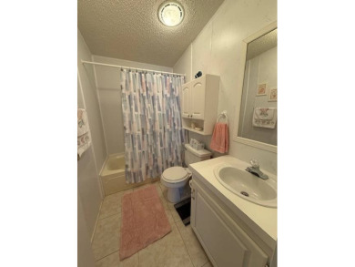 Looking for the perfect, move-in-ready retreat in a thriving 55+ on Hamptons Golf Club in Florida - for sale on GolfHomes.com, golf home, golf lot