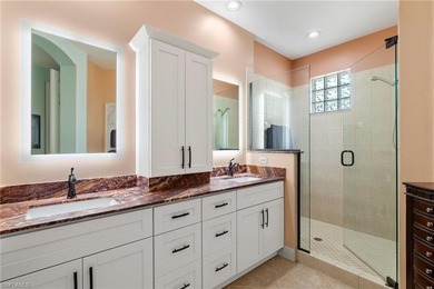 Golf membership included with purchase. This 2nd floor end unit on Pelican Sound Golf and River Club in Florida - for sale on GolfHomes.com, golf home, golf lot