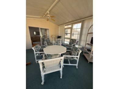 Looking for the perfect, move-in-ready retreat in a thriving 55+ on Hamptons Golf Club in Florida - for sale on GolfHomes.com, golf home, golf lot