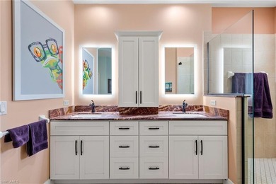 Golf membership included with purchase. This 2nd floor end unit on Pelican Sound Golf and River Club in Florida - for sale on GolfHomes.com, golf home, golf lot