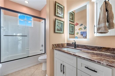 Golf membership included with purchase. This 2nd floor end unit on Pelican Sound Golf and River Club in Florida - for sale on GolfHomes.com, golf home, golf lot