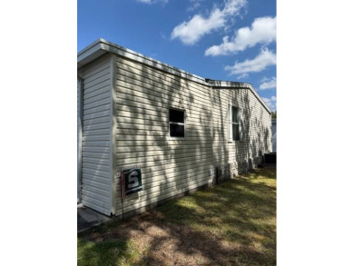 Looking for the perfect, move-in-ready retreat in a thriving 55+ on Hamptons Golf Club in Florida - for sale on GolfHomes.com, golf home, golf lot