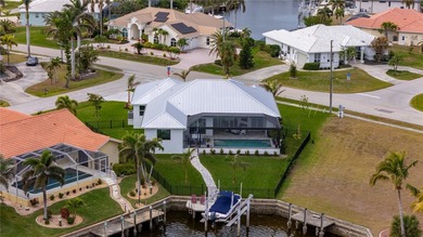 2023-built waterfront masterpiece in the highly sought-after on Saint Andrews South Golf Club in Florida - for sale on GolfHomes.com, golf home, golf lot