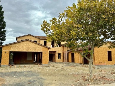 This 4,132 sq. ft., 5-bedroom, 4.5-bath Spanish-style on The Club at Copper Valley Golf Course in California - for sale on GolfHomes.com, golf home, golf lot