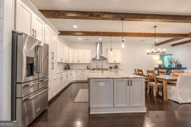 Impeccable craftsmanship end unit Townhome with golf course on Bridgemill Golf Club in Georgia - for sale on GolfHomes.com, golf home, golf lot