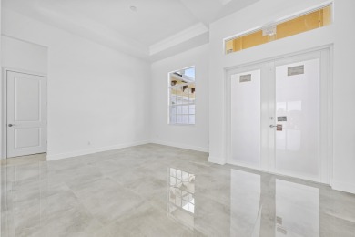 Brand-new modern estate in Palm City's prestigious Cobblestone on The Cape Club of Palm City in Florida - for sale on GolfHomes.com, golf home, golf lot