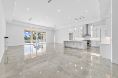Brand-new modern estate in Palm City's prestigious Cobblestone on The Cape Club of Palm City in Florida - for sale on GolfHomes.com, golf home, golf lot