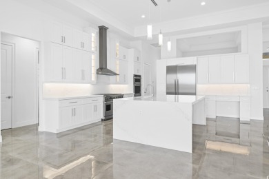 Brand-new modern estate in Palm City's prestigious Cobblestone on The Cape Club of Palm City in Florida - for sale on GolfHomes.com, golf home, golf lot