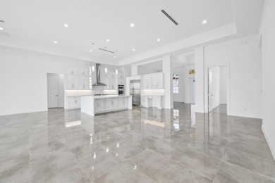 Brand-new modern estate in Palm City's prestigious Cobblestone on The Cape Club of Palm City in Florida - for sale on GolfHomes.com, golf home, golf lot