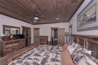 Nestled in the serene beauty of the North Georgia mountains on White Path Golf Club in Georgia - for sale on GolfHomes.com, golf home, golf lot