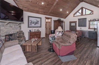 Nestled in the serene beauty of the North Georgia mountains on White Path Golf Club in Georgia - for sale on GolfHomes.com, golf home, golf lot