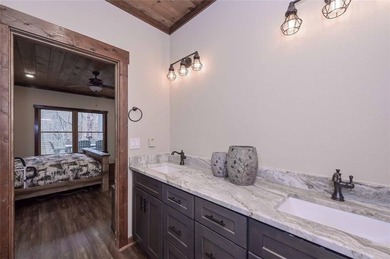 Nestled in the serene beauty of the North Georgia mountains on White Path Golf Club in Georgia - for sale on GolfHomes.com, golf home, golf lot