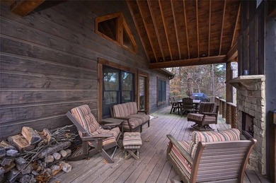 Nestled in the serene beauty of the North Georgia mountains on White Path Golf Club in Georgia - for sale on GolfHomes.com, golf home, golf lot