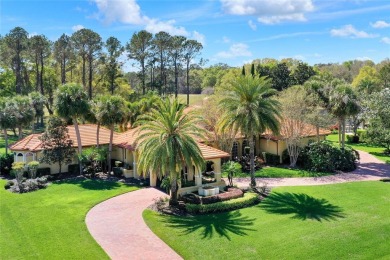 Make this beautifully- detailed Mediterranean home yours! on Windermere Country Club in Florida - for sale on GolfHomes.com, golf home, golf lot