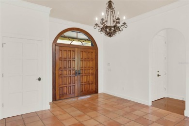 Make this beautifully- detailed Mediterranean home yours! on Windermere Country Club in Florida - for sale on GolfHomes.com, golf home, golf lot