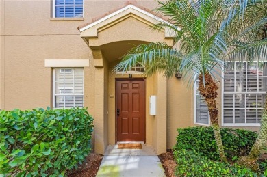 Desirable first floor end unit in the Sabal Palm Community of on The Club At Grandezza in Florida - for sale on GolfHomes.com, golf home, golf lot