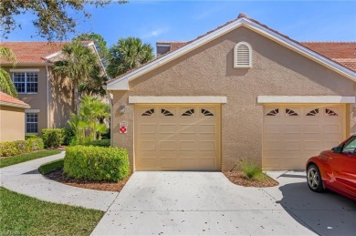 Desirable first floor end unit in the Sabal Palm Community of on The Club At Grandezza in Florida - for sale on GolfHomes.com, golf home, golf lot