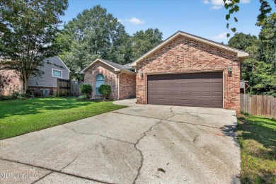 a beautifully maintained and thoughtfully upgraded 4-bedroom on Diamondhead Country Club in Mississippi - for sale on GolfHomes.com, golf home, golf lot