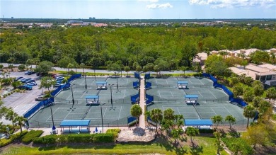 Desirable first floor end unit in the Sabal Palm Community of on The Club At Grandezza in Florida - for sale on GolfHomes.com, golf home, golf lot