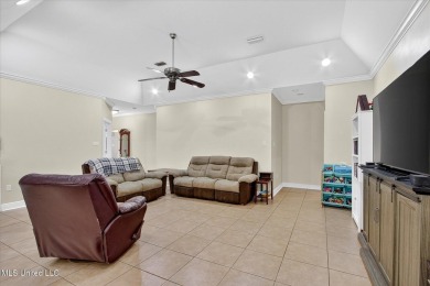 a beautifully maintained and thoughtfully upgraded 4-bedroom on Diamondhead Country Club in Mississippi - for sale on GolfHomes.com, golf home, golf lot