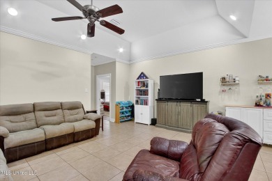 a beautifully maintained and thoughtfully upgraded 4-bedroom on Diamondhead Country Club in Mississippi - for sale on GolfHomes.com, golf home, golf lot