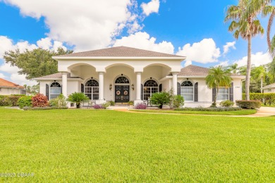 Step into refined living with this spacious executive retreat on Spruce Creek Golf Club in Florida - for sale on GolfHomes.com, golf home, golf lot