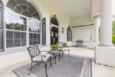 Step into refined living with this spacious executive retreat on Spruce Creek Golf Club in Florida - for sale on GolfHomes.com, golf home, golf lot