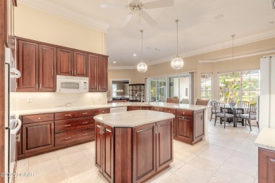 Step into refined living with this spacious executive retreat on Spruce Creek Golf Club in Florida - for sale on GolfHomes.com, golf home, golf lot