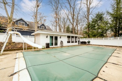 Nestled in the heart of Harbor Country, this 4 bedroom Grand on Grand Beach Municipal Golf Course in Michigan - for sale on GolfHomes.com, golf home, golf lot