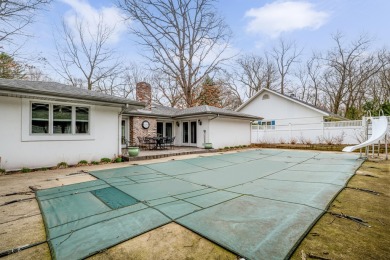 Nestled in the heart of Harbor Country, this 4 bedroom Grand on Grand Beach Municipal Golf Course in Michigan - for sale on GolfHomes.com, golf home, golf lot