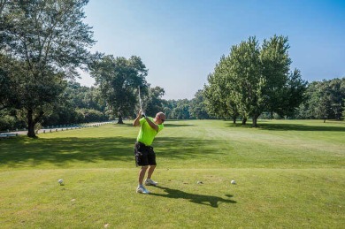 Nestled in the heart of Harbor Country, this 4 bedroom Grand on Grand Beach Municipal Golf Course in Michigan - for sale on GolfHomes.com, golf home, golf lot