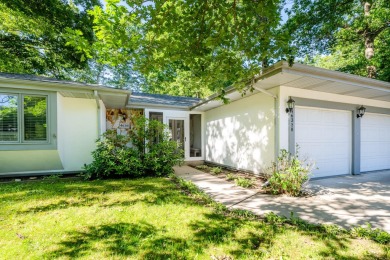 Nestled in the heart of Harbor Country, this 4 bedroom Grand on Grand Beach Municipal Golf Course in Michigan - for sale on GolfHomes.com, golf home, golf lot