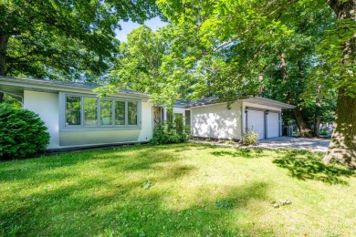 Nestled in the heart of Harbor Country, this 4 bedroom Grand on Grand Beach Municipal Golf Course in Michigan - for sale on GolfHomes.com, golf home, golf lot