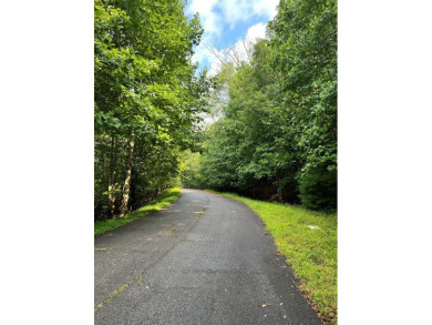 Beautiful wooded lot with seasonal mountain view located in the on Chatuge Shores Golf Course in North Carolina - for sale on GolfHomes.com, golf home, golf lot