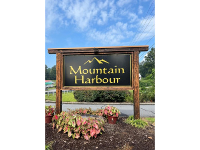 Beautiful wooded lot with seasonal mountain view located in the on Chatuge Shores Golf Course in North Carolina - for sale on GolfHomes.com, golf home, golf lot