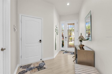 SENSATIONAL VILLA with an AMAZING view of first hole/pond in the on Kings Gate Golf Club in Florida - for sale on GolfHomes.com, golf home, golf lot