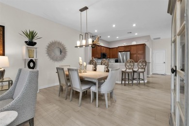 SENSATIONAL VILLA with an AMAZING view of first hole/pond in the on Kings Gate Golf Club in Florida - for sale on GolfHomes.com, golf home, golf lot