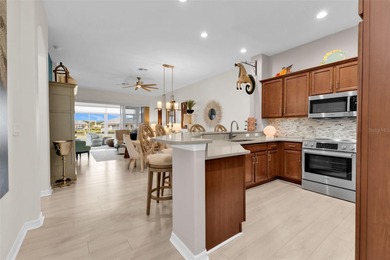 SENSATIONAL VILLA with an AMAZING view of first hole/pond in the on Kings Gate Golf Club in Florida - for sale on GolfHomes.com, golf home, golf lot