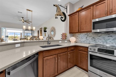 SENSATIONAL VILLA with an AMAZING view of first hole/pond in the on Kings Gate Golf Club in Florida - for sale on GolfHomes.com, golf home, golf lot