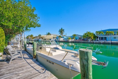 Welcome to your dream getaway in the heart of Key Colony Beach! on Key Colony Beach Golf Course in Florida - for sale on GolfHomes.com, golf home, golf lot
