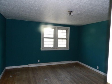 Over 2,252 square home  with four bedroom, three bath home on Lynx Golf Course in Michigan - for sale on GolfHomes.com, golf home, golf lot