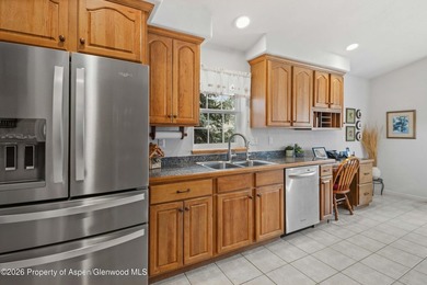 Welcome to this beautifully designed 4-bedroom, 2-bath home on Battlement Mesa Golf Course in Colorado - for sale on GolfHomes.com, golf home, golf lot