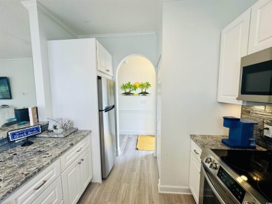 OPEN HOUSE SATURDAY MAY 31 ( 12PM - 2PM )  First-floor end unit on Myrtlewood Golf Course and Club  in South Carolina - for sale on GolfHomes.com, golf home, golf lot