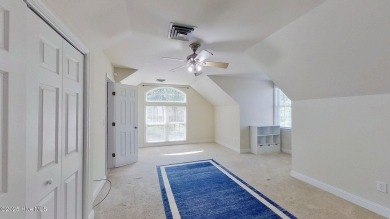 Nestled along the fairway in the gated, amenity-rich community on Harbour Point Golf Club in North Carolina - for sale on GolfHomes.com, golf home, golf lot