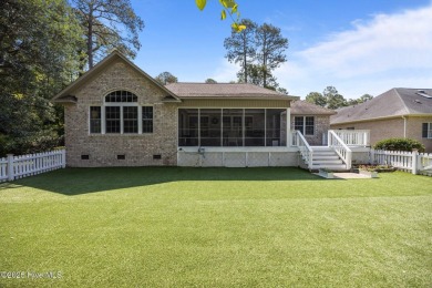 Nestled along the fairway in the gated, amenity-rich community on Harbour Point Golf Club in North Carolina - for sale on GolfHomes.com, golf home, golf lot