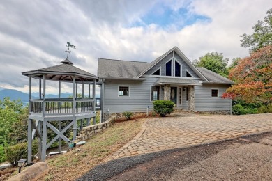 Breathtaking views abound from this 3-bedroom, 3.5-bath home on on Chatuge Shores Golf Course in North Carolina - for sale on GolfHomes.com, golf home, golf lot