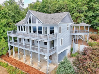 Breathtaking views abound from this 3-bedroom, 3.5-bath home on on Chatuge Shores Golf Course in North Carolina - for sale on GolfHomes.com, golf home, golf lot