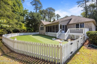 Nestled along the fairway in the gated, amenity-rich community on Harbour Point Golf Club in North Carolina - for sale on GolfHomes.com, golf home, golf lot