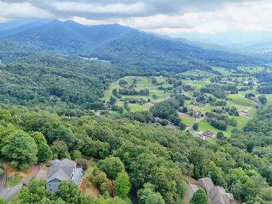 Breathtaking views abound from this 3-bedroom, 3.5-bath home on on Chatuge Shores Golf Course in North Carolina - for sale on GolfHomes.com, golf home, golf lot